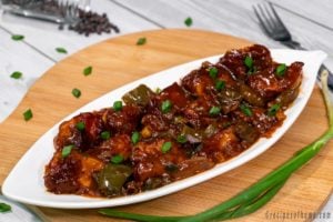chilli-chicken-dry-place-on-white-plate