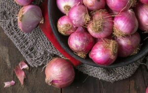 Use onion to clean burnt utensils